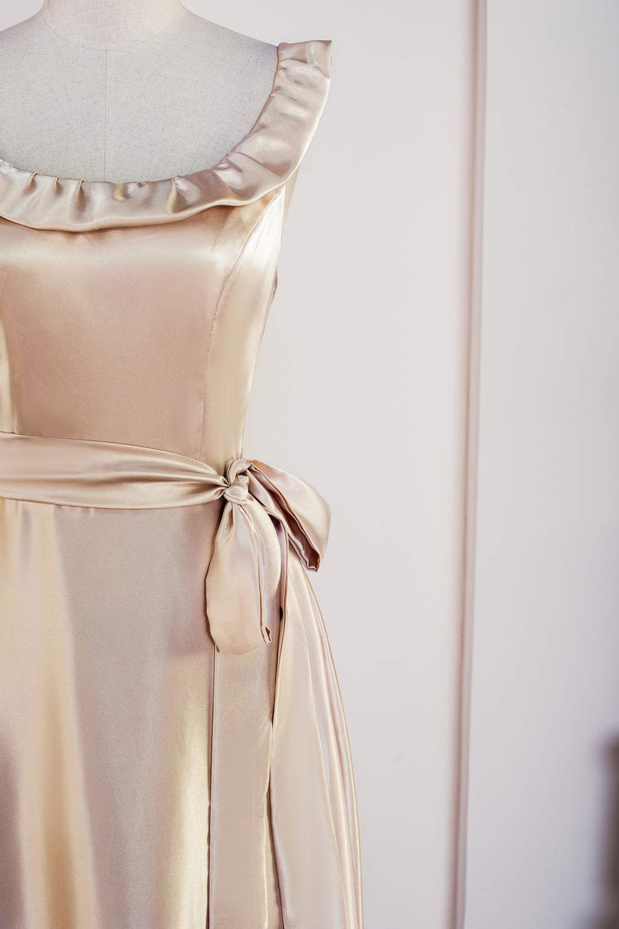Champagne Ruffled Sleeveless Tea-Length Bridesmaid Dress with Sash