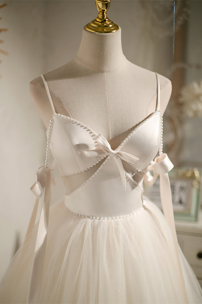 Champagne Beaded Cut-Out Bow Tie Straps Homecoming Dress